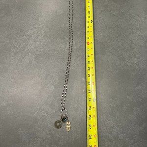 Beaded necklace with charms